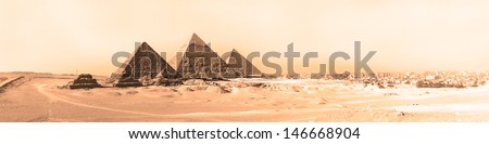 The pyramids of Giza, Cairo, Egypt;  the oldest of the Seven Wonders of the Ancient World, and the only one to remain largely intact.