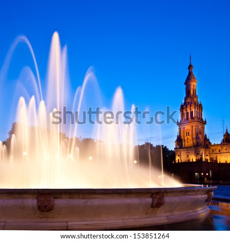 A view of fountain at Plaza de Espana (Spain Square) and Seville town hall, Andalusia, Spain, Europe. Spain square was designed by Anibal Gonzalez and is located in the celebrated Maria Luisa Park.