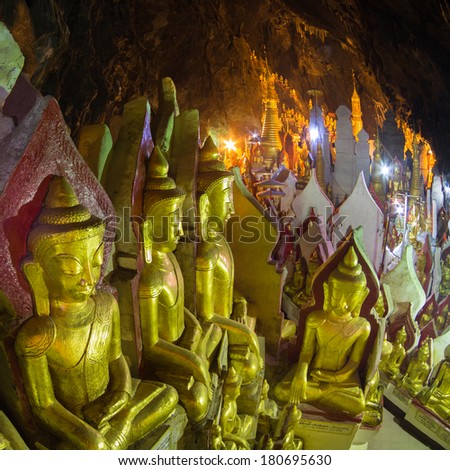 Golden Buddha statues in Pindaya Cave located next to the town of Pindaya, Shan State, Burma (Myanmar) are a Buddhist pilgrimage site and a tourist attraction.