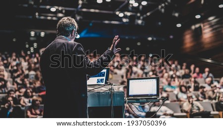 Public speaker giving talk at Business Event. 商業照片 © 