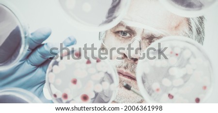 Similar – Image, Stock Photo Life science researcher grafting bacteria.