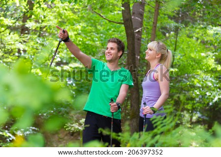 Similar – Image, Stock Photo Young spoty active cople biking in nature. Active lifestyle. Activities and recreation outdoors.
