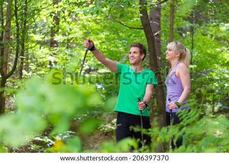 Similar – Image, Stock Photo Young spoty active cople biking in nature. Active lifestyle. Activities and recreation outdoors.