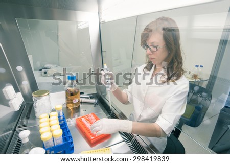 Similar – Image, Stock Photo Life science researcher grafting bacteria.