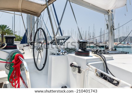 Big white sailing catamaran helm station