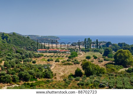Greek coastline landscape. Sea, hills and camping