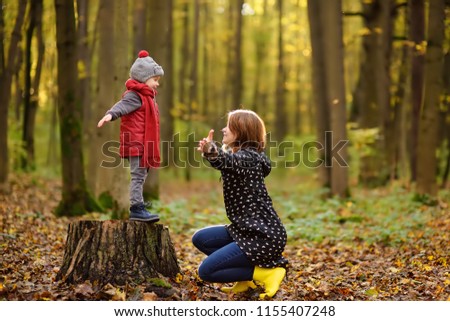 Similar – Foto Bild Frau beim Spaziergang am Damm