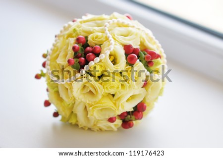 Beautiful wedding flowers bouquet (made of roses) on the white background