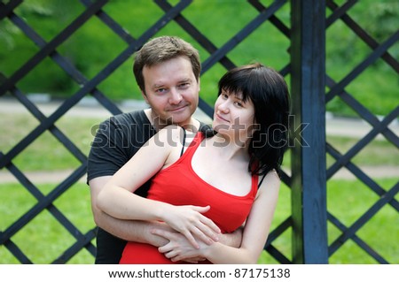 Beautiful mixed couple in park