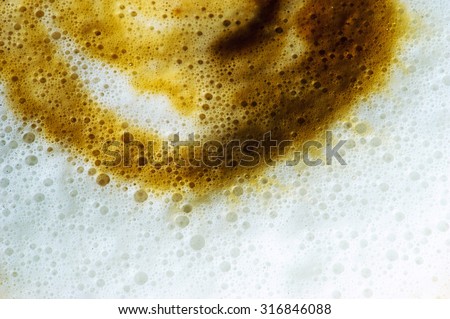 foaming milk in coffee