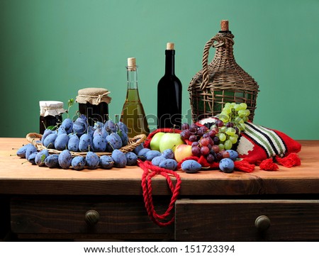 Fresh fruit, wine and plum jam