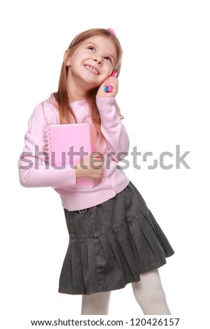 Studio portrait of school girl looking up with colorful felt-tip pens isolated on white background on Education and Art theme/Happy beautiful little girl with felt-tip pens