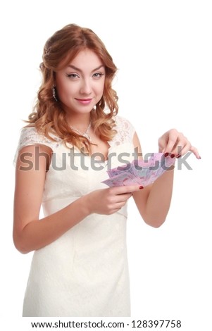 Fun girl with money over white background on business theme