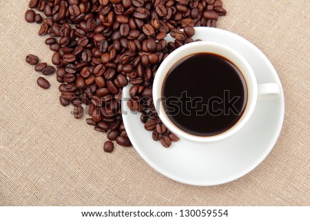 Cup of coffee on Food and Drink conceptual theme/Black coffee, a cup of beans