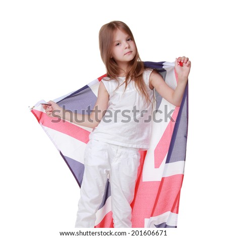 Beautiful little girl with a big flag of of Great Britain isolated on white