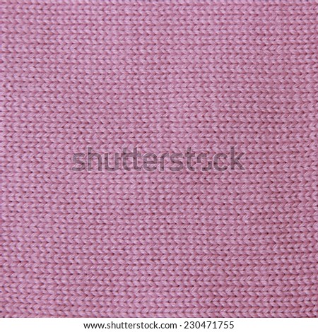 closeup of seamless pink knitted fabric texture