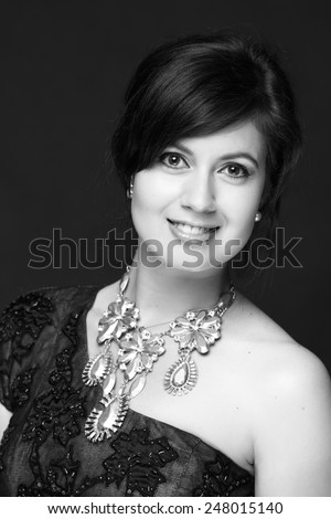 Black and white art photo/ Elegant lady with stylish hairstyle on Beauty and Fashion