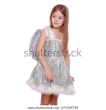 Studio image of silver little angel isolated on Christmas/Little fairy angel with magic wand laughing - isolated with copy space