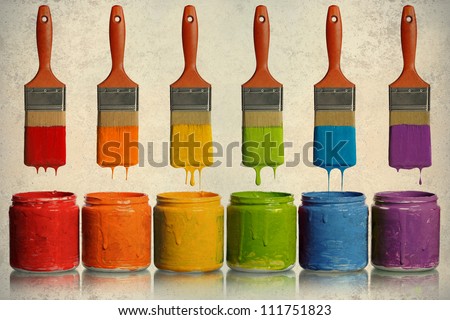 Grunge poster with paintbrushes dripping paint of various colors into containers