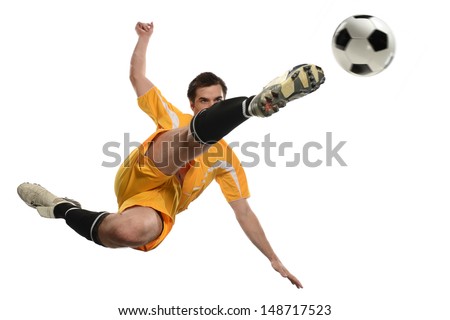 Soccer Player Kicking Ball While Jumping Isolated Over White Background ...