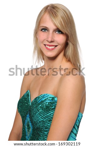 Portrait of beautiful young woman dressed in evening gown isolated over white background