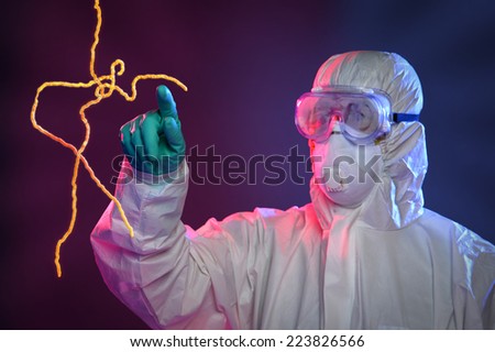 Scientist in Hazmat suit and protective gear pointing at Ebola virus