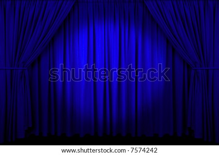 Large blue curtain with spot light and fading into dark.