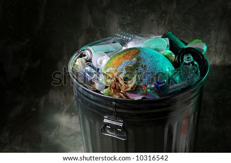 Trash can with earth and rubbish