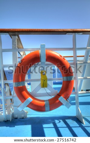 Life ring on a boat with the ocean in background