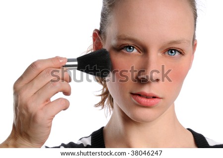 Portrait of woman applying make up isolated over white background