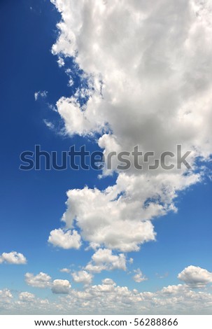 Blue sky with large clouds in vertical format