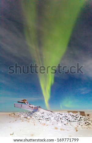The aurora borealis or the northern lights or Northern light at Skaftafell Iceland by the monument Skeidararsandur