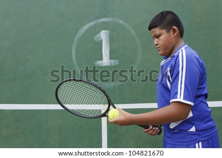 Thai boy tennis player learning how to preparing to play tennis