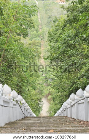See view while go down on concrete stairway from mountain in Thailand