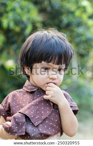Portrait of asian cute little boy itch allergy skin