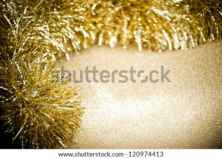 festive garland on sparkles background