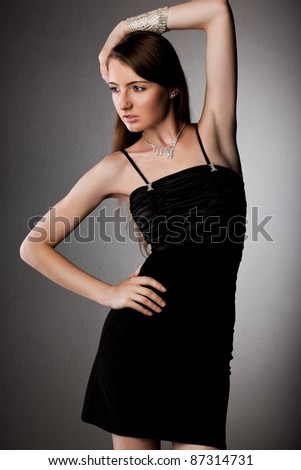 elegant fashionable woman with silver jewelry