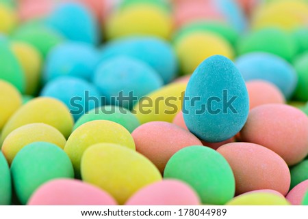 Close up of numerous candy coated chocolate Easter mini eggs. Selective Focus.