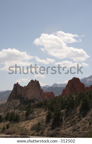 Clouds above the rock formations at Garden of the Gods, Colorado Springs, vertical orientation