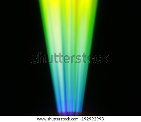 coloured light stripes on shiny plastic surface defocused