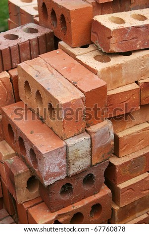 Pile of common building bricks ready for use.