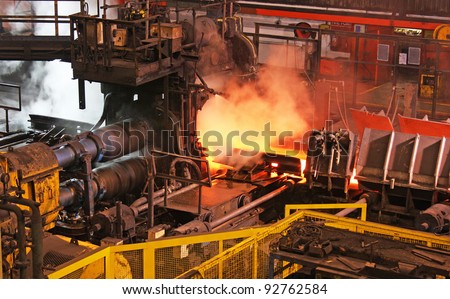 Steel rolling mill in action.