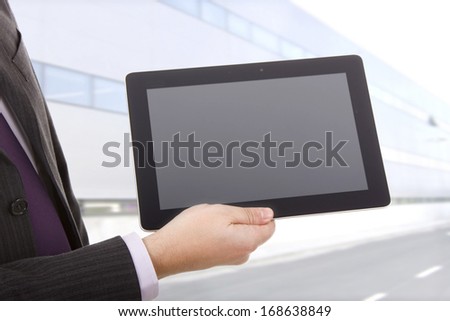 businessman using touch pad, close up shot