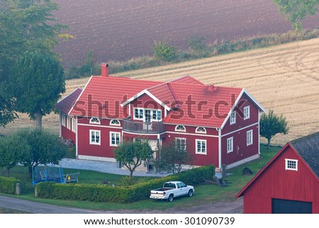 ALLEBERG, SWEDEN, SEPTEMBER, 2013: House and garden at a farm in the countryside in sweden.