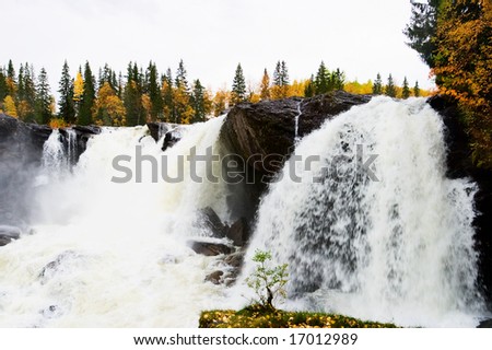 Big Waterfall and autumn color in the forest