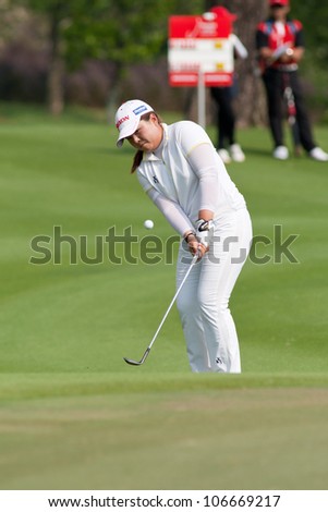 PATTAYA, THAILAND-FEBRUARY 16: Inbee Park of Korea ships the ball towards hole 18 during day 1 of Honda LPGA 2012 on February 16, 2012 at Siam Country Club Old Course in Pattaya, Thailand
