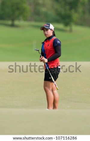 PATTAYA, THAILAND - FEBRUARY 16: Moriya Juntanugarn of Thailand thinks of her next move on day 1 of Honda LPGA Thailand 2012 on February 16 2012 at Siam Country Club Old Course in Pattaya, Thailand