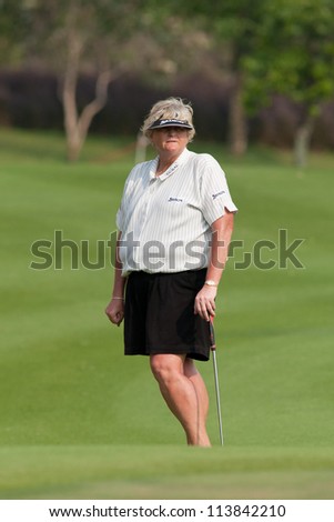 PATTAYA THAILAND - FEBRUARY 16: Laura Davies of England thinks of her next move during Day 1 of Honda LPGA Thailand 2012 on February 16, 2012 at Siam Country Club Old Course in Pattaya, Thailand