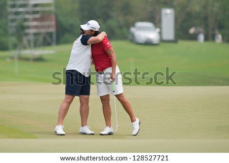 PATTAYA, THAILAND-FEBRUARY 17: Yani Tseng of Taiwan says good bye after finishing Round 2 of Honda LPGA 2012 on February 17, 2012 at Siam Country Club Old Course in Pattaya, Thailand