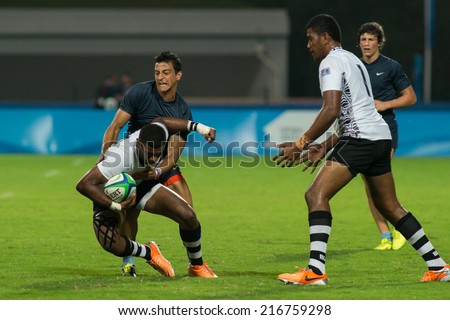 NANJING, CHINA-AUGUST 18: Fiji Rugby Team (white) plays against Argentina Rugby Team (blue) during Day 2 match of 2014 Youth Olympic Games on August 18, 2014 in Nanjing, China.